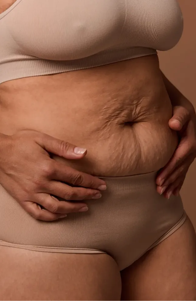Woman holding belly