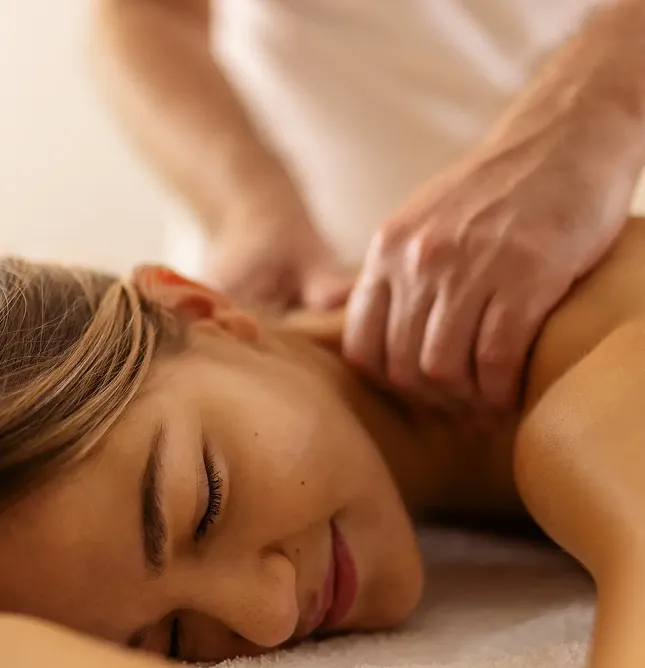 Woman getting neck massage