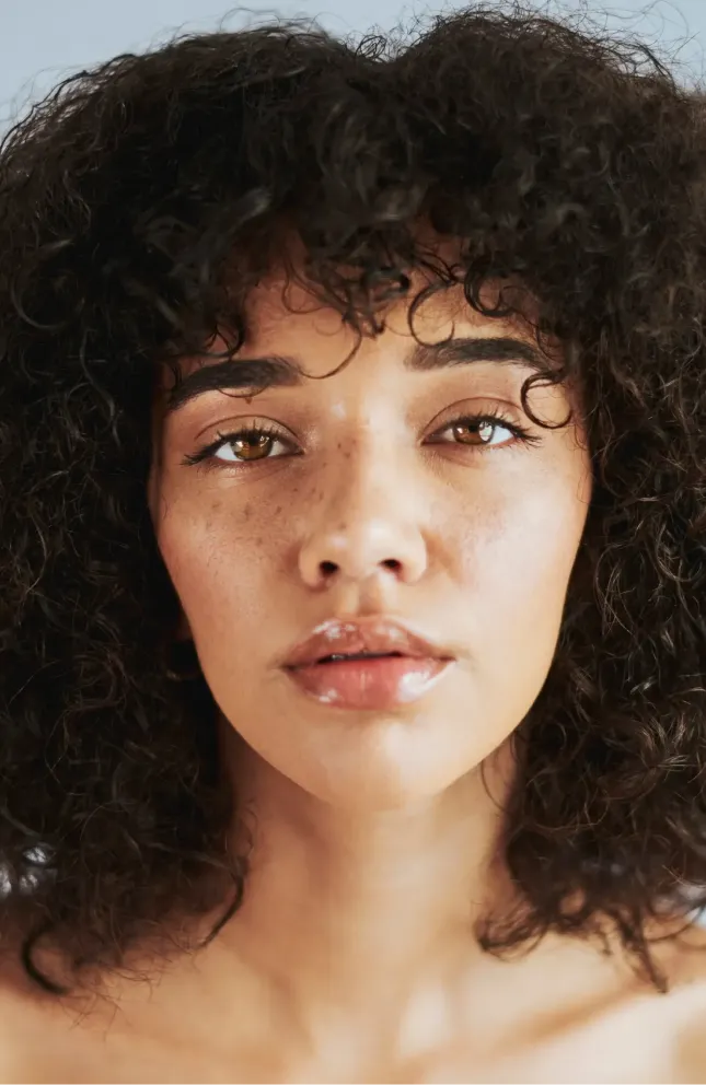 Girl with dark curly hair